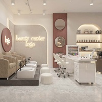 Mobilier de salon de beauté moderne et écologique avec éclairage LED personnalisé, lits de soin, bureaux de réception, armoires de rangement, étagères de présentation, intérieur