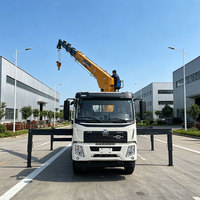 Grue montée sur camion de marque JIUBANG de 12 tonnes, flèche télescopique hydraulique, rotation à 360 degrés, hauteur de levage de 21 m, utilisation en construction