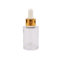 Flacon compte-gouttes en verre rond transparent à épaule plate de 20ML, 30ML, 40ML, 50ML pour cosmétiques avec bouchon doré