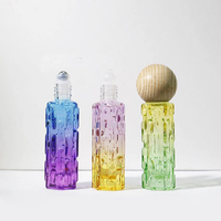 Vente en gros directe usine : Flacons de luxe en verre de 10 ml avec bouchon en bois et roll-on dégradé pour parfums et huiles essentielles féminines