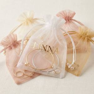 Pochette en <span class=keywords><strong>organza</strong></span> transparente avec logo <span class=keywords><strong>personnalisé</strong></span>, sac cadeau de luxe pour mariage, emballage de bijoux, sac en maille à cordon, vente en gros en provenance d'usine - Product Image 1