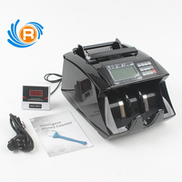 Machine de comptage de billets professionnelle UV MG avec reconnaissance automatique des devises et capacité de la trémie de 200 pièces
