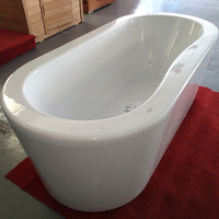 Baignoire autoportante ovale en acrylique avec design blanc simple et drain central blanc ajoutant une fonction de massage-taxe incluse