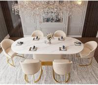 Table à manger ovale avec cadre doré, ensemble en cuir crème, plateau en pierre, élégante, 6 places, pour hôtel, restaurant, personnalisation possible