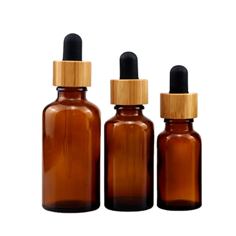 5ml 10ml 15ml 20ml 30ml 50ml 100ml forma rotonda bottiglia di vetro contagocce olio essenziale con coperchio di bambù