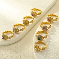 Bague tendance en acier inoxydable plaqué or 18 carats avec incrustations de zirconiums cubiques étincelants et bande torsadée, idéale pour le quotidien et les soirées.