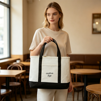 Sac fourre-tout en toile noir et blanc personnalisé avec logo pour femme, brodé, bicolore, robuste, idéal pour studio de fitness et salle de sport (vente en gros)