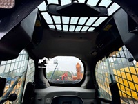 Chargeuse sur pneus Caterpillar 246D d'occasion avec cabine climatisée, faible nombre d'heures, pour travaux de construction