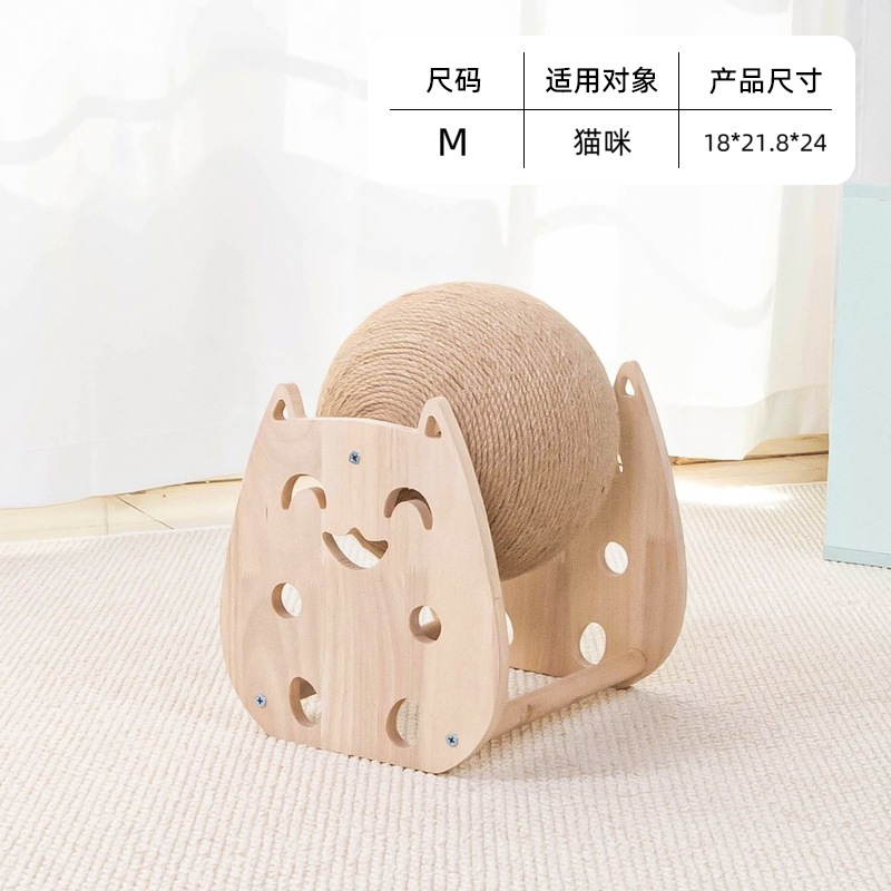 Chat attrapant une balle.