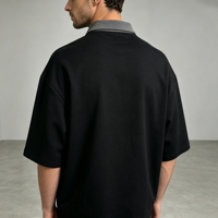 Polo noir à blocs de couleur, 100 % coton, sérigraphié, coupe ample oversize, style streetwear