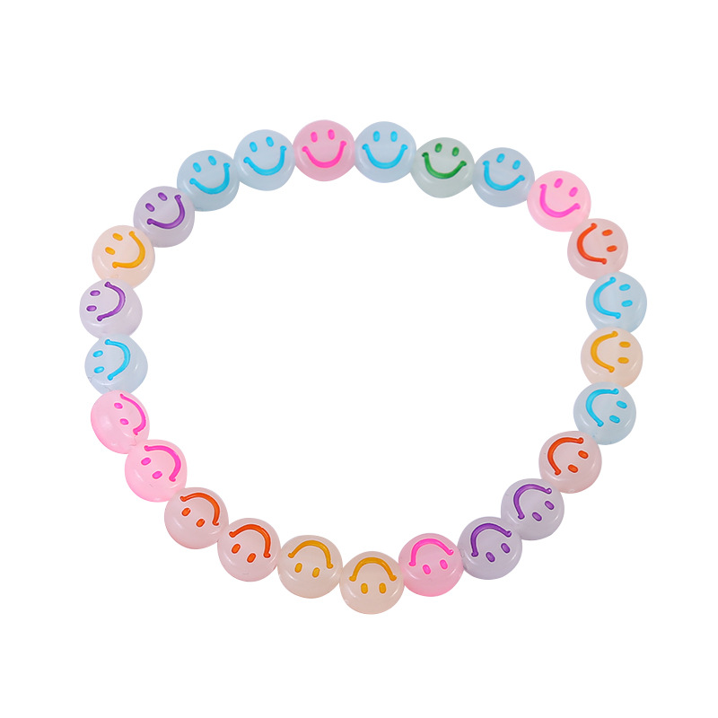 Visage souriant multicolore