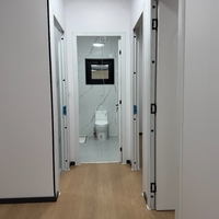 Vente chaude 2026-2027 Villa modulaire Maison préfabriquée Maison conteneur Maison préfabriquée Panneau en laine de roche à grain de bois pour hôtel de villégiature