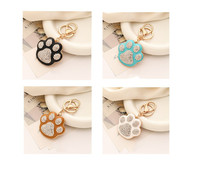Porte-clés mignon en émail avec empreinte de patte et strass, breloque de sac en forme de patte de chien ou de chat, cadeau souvenir tendance pour les amoureux des animaux