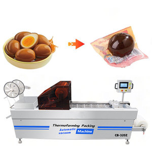 Machine d'emballage <span class=keywords><strong>sous</strong></span> <span class=keywords><strong>vide</strong></span> continu pour œufs de caille, paneer, dattes et <span class=keywords><strong>aliments</strong></span> surgelés avec contrôle avancé - Product Image 1
