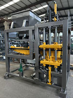 Machine de formage de blocs de béton entièrement automatique Machine de fabrication de briques QT4-15S ciment