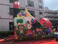 Glissière gonflable colorée de thème de clown rouge pour le château de rebond de terrains de jeux avec la conception drôle de clown pour le divertissement des enfants