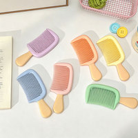 Mini peigne à cheveux en forme de crème glacée, brosse à cheveux portable antistatique en plastique pour les voyages et l'usage quotidien