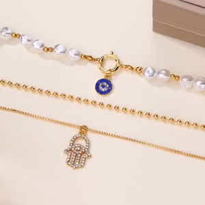 Collar de cadena de eslabones de <span class=keywords><strong>perlas</strong></span> doradas con colgante de aleación de imitación de <span class=keywords><strong>ojos</strong></span>, elegante y de nicho, para mujer, estilo vintage, para la clavícula. - Product Image 2