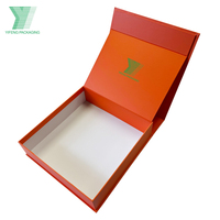 Caja de regalo de exhibición de ropa de lujo de papel plegable con imán naranja personalizado, caja de regalo Premium para embalaje de ropa