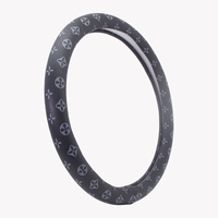Housse de volant de luxe noire à monogramme, texture fine, cuir PU antidérapant, accessoires intérieurs universels pour voiture
