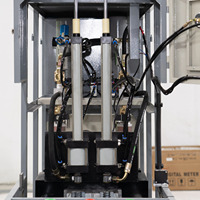 Machine de soufflage de bouteilles d'eau en plastique PET semi-automatique Ouge, modèle CJ-A2-3000E, force de serrage 1000kN, éjection automatique par PLC