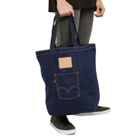 Jeans de sac en denim bleu profond personnalisés pour les jeunes dernière conception très à la mode fermeture à boucle à poignée automatique en PP tissé
