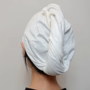 Gorro desechable para secar el cabello sin enjuague, ideal para viajes y hoteles - Product Image 1