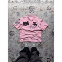 Polo rose surdimensionné OEM avec imprimé œil abstrait et signature – Haut décontracté à manches courtes pour homme, style streetwear