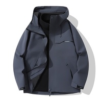 Veste de travail d'hiver imperméable unisexe à capuche trois-en-un avec logo imprimé et doublure en polaire pour la montagne