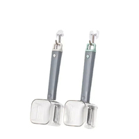 Gadget de cuisine en acier inoxydable à tête unique éplucheur de légumes et de fruits à long manche éplucheur créatif avec rangement