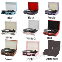 Lecteur de disques vinyles portable de bonne qualité, style rétro vintage, avec 3 vitesses, haut-parleurs, couleur bois, en plastique et bois.