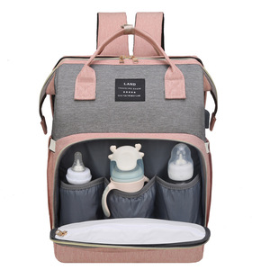 Bolsa de pañales <span class=keywords><strong>para</strong></span> mamá de gran capacidad al por mayor con bandeja de <span class=keywords><strong>cuna</strong></span> adjunta y <span class=keywords><strong>cambiador</strong></span> de pañales y kit de cuidado <span class=keywords><strong>para</strong></span> madre y bebé - Product Image 1