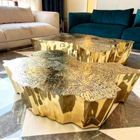 Table basse moderne de luxe en acier inoxydable, durable, avec plateau miroir irrégulier, pour hall d'hôtel et mobilier de projet de villa