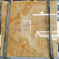 Pierre d'onyx jaune naturel au design moderne Panneau mural rétro-éclairé en marbre d'onyx miel de Chine Surface polie Grande dalle 1 an pour hôtel