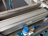 Machine de remplissage horizontale à tête unique en acier inoxydable de qualité alimentaire pour miel et sauce tomate, idéale pour les petites entreprises