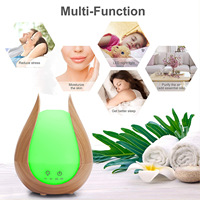 Diffuseur d'huiles essentielles en plastique imitation bois 200 ml pour dropshipping ; Mini humidificateur ultrasonique avec lumière LED 7 couleurs et fonction de minuterie