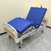 Lit médical électrique 2 fonctions en gros avec télécommande anglaise, matelas étanche et roulettes silencieuses avec frein pour usage clinique