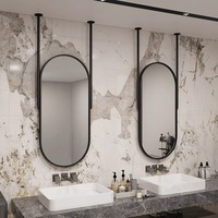 Miroir ovale suspendu intelligent à LED avec cadre en métal et fer, finition noir et or, design moderne d'Europe du Nord pour hôtel et maison