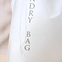 Sac à linge en non-tissé recyclable blanc bon marché avec cordon de serrage pour hôtel de luxe