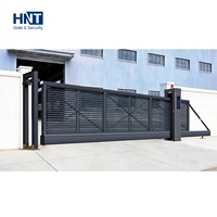 Portail coulissant cantilever industriel robuste sans rail, automatique, pour allée de stationnement sécurisée et entrée principale