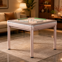 Nouvelle table de mahjong silencieuse dorée en stock, idéale pour le divertissement et les dîners en famille dans la salle d'échecs et de jeux de cartes