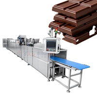 Ligne de production de chocolat entièrement automatique de qualité industrielle en acier inoxydable, conçue pour les fabricants de chocolat, capacité de production de bonbons personnalisable