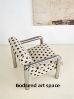 Fauteuil individuel rétro à pois style Bauhaus, fauteuil lounge de luxe léger et mobile avec structure en tube d'acier inoxydable, chaise de designer pour salons