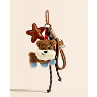 Porte-clés en peluche chiot marron esthétique, design anime doux, breloque de sac chien Kawaii, pendentif étoile de mer chaussures bleues, accessoires de sac à dos