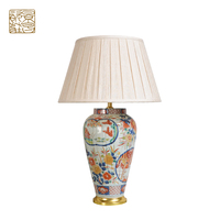 Lampe de table électrique noire en céramique de style nordique moderne de luxe avec abat-jour tambour pour chambre à coucher (vente en gros)