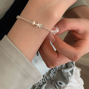 ของขวัญเครื่องประดับแฟชั่นสร้อยข้อมือปรับได้สำหรับผู้หญิงลูกปัดเงินมุกเปลือกหอยปลาดาว - Product Image 1