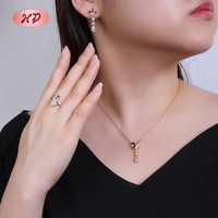 Ensemble de boucles d'oreilles et de bagues en zircon plaqué or 18 carats avec motif floral coloré élégant pour mariage et cadeaux de fête quantité minimale de commande en vrac 6