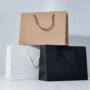 Ucuz toptan düşük fiyat özel baskılı lüks Kraft hediye kağıt alışveriş torbaları giysi için - Product Image 1