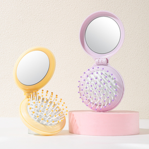 LMLTOP Cute Mini Foldable <strong>Ionic</strong> <strong>Hair</strong> Comb Mirror Plastic Air Cushion Anti-Static Massager <strong>Hair</strong> <strong>Brush</strong> Travel Salon Airbag SY757 - Product Image 1