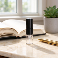 Atomiseur de parfum rechargeable en verre transparent de 1 ml pour la vente en gros, mini flacon de voyage avec capuchon noir/blanc et pulvérisateur à brume fine